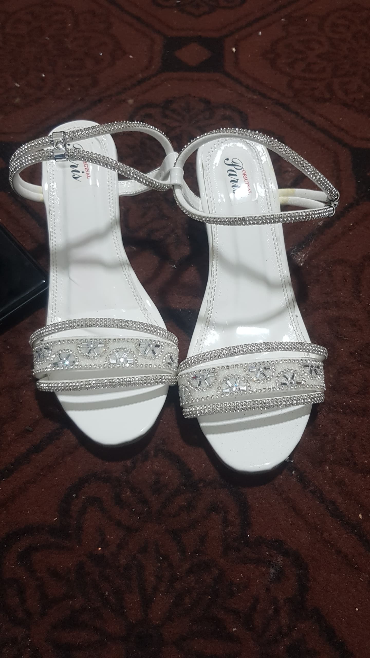 Women’s White Pointed-Toe Slingback High Heels.